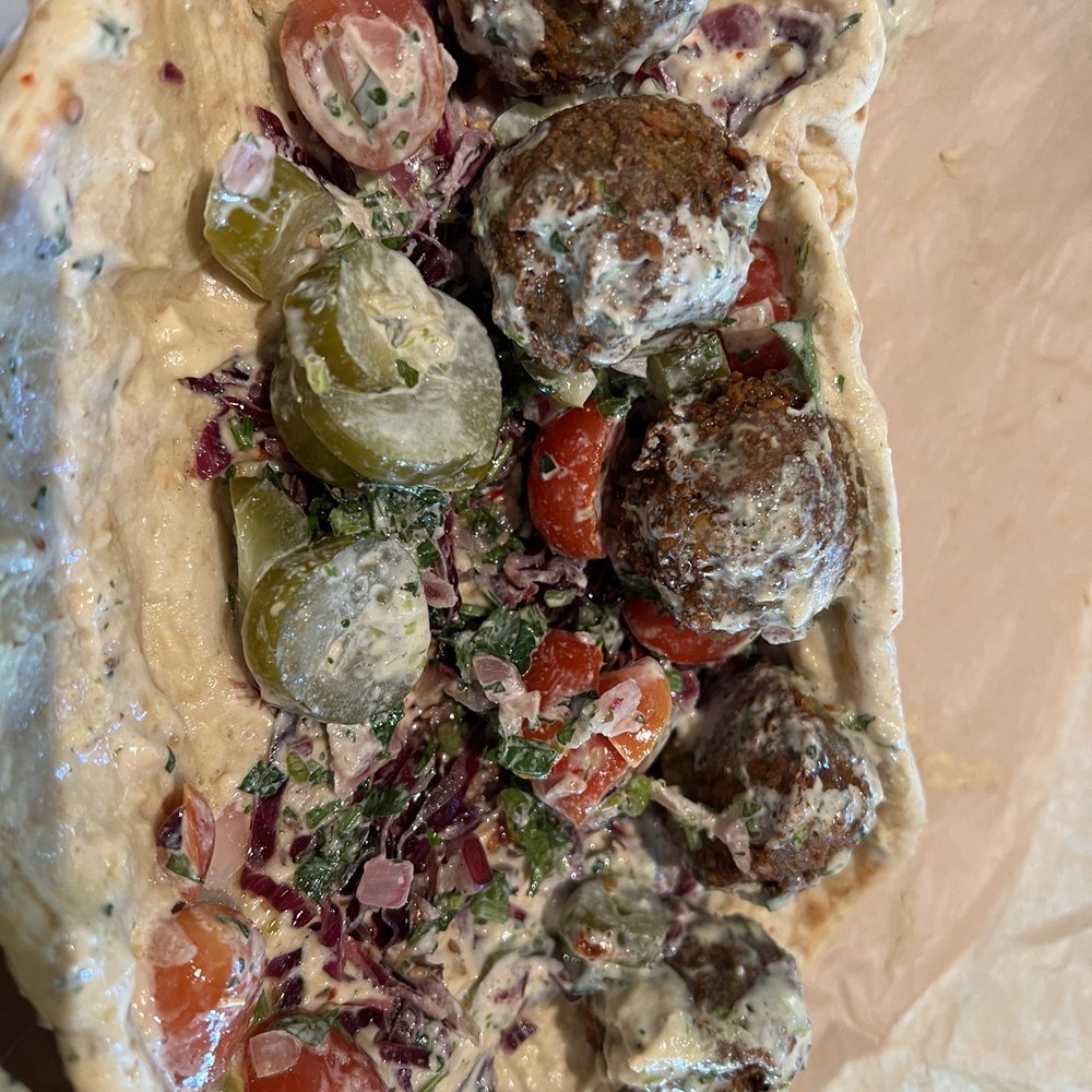 Cava - Inside the falafel sandwich - Mediterranean Near Me - Woodbridge, Virginia Cava - Inside the falafel sandwich - Mediterranean Near Me - Woodbridge, Virginia