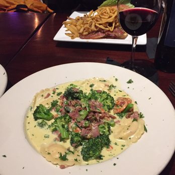 Assembly - Lobster ravioli with a sneak peak of the smokehouse burger in the background. - American Near Me - Quincy, Massachusetts Assembly - Lobster ravioli with a sneak peak of the smokehouse burger in the background. - American Near Me - Quincy, Massachusetts