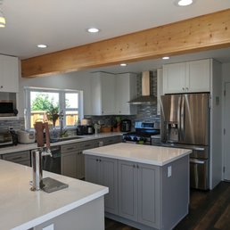 a kitchen with stainless steel appliances