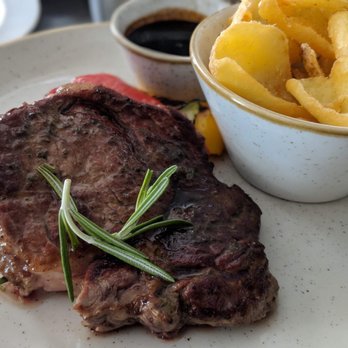 Como restaurant & cocktail bar - Fresh Herb Marinated Steak - Mediterranean Near Me - Prague, Puerto Rico Como restaurant & cocktail bar - Fresh Herb Marinated Steak - Mediterranean Near Me - Prague, Puerto Rico