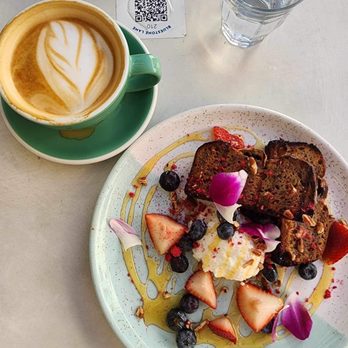 Bluestone Lane - Gluten free banana bread with honey drizzled ricotta and fresh fruit, classic latte coffee - Coffee & Tea Near Me - Orange, California
