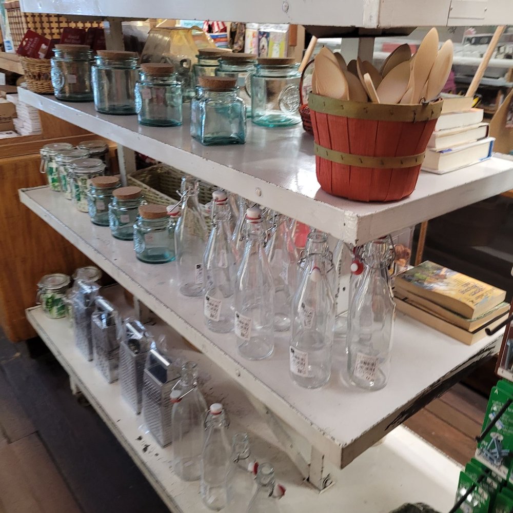 Joyce General Store - a shelf of empty glassware - Grocery Near Me - Port Angeles, Washington