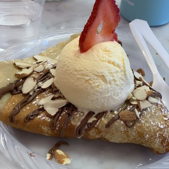P.S. I Crepe You - This crepe is one of their signature ones. forgot what it's called, but it has banana, strawberry, nuts and almonds. I added ice cream to it - Coffee & Tea Near Me - Riverside, California P.S. I Crepe You - This crepe is one of their signature ones. forgot what it's called, but it has banana, strawberry, nuts and almonds. I added ice cream to it - Coffee & Tea Near Me - Riverside, California