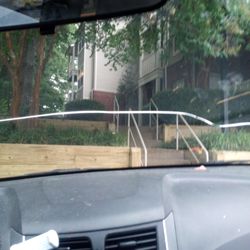 Parcreston - Parc Reston sidewalk washer with hose, knock and cracked the window of my car. He wanted me to move and told him I could not bc I was unload