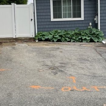 Integrity Paving - Before, top of driveway starting to sink due to drainage. - Patio Coverings Near Me - Wakefield, Massachusetts