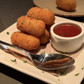 La Bodeguita Del Medio - CROQUETAS | 14.6 crispy potato fritters with aged manchego cheese, pimenton, chives, tamarind-smoked jalapeno BBQ sauce - Cuban Near Me - Palo Alto, California La Bodeguita Del Medio - CROQUETAS | 14.6 crispy potato fritters with aged manchego cheese, pimenton, chives, tamarind-smoked jalapeno BBQ sauce - Cuban Near Me - Palo Alto, California