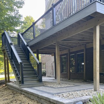 Premiere Landscape Services - After - deck steps now have a proper landing that ties to the entire backyard. - Landscaping Near Me