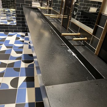 The Fly-By - Restaurant washroom.  Impossible to wash hands without touching the dirty water. Fancy but GROSS - Cafes Near Me - Mountain View, California