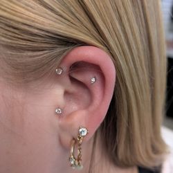 Pricked Piercing - Flat Helix and Forward Helix piercings at this visit