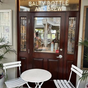 Salty Bottle & Brew  - Seating next to entrance - Wine Tasting Room Near Me - Rosemary Beach, Florida