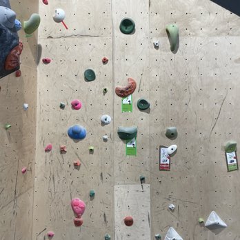 Climb at the Loop - Our first challenge aka problem. Following the green colored holds/grips. - Rock Climbing Near Me - Burlington, Wisconsin