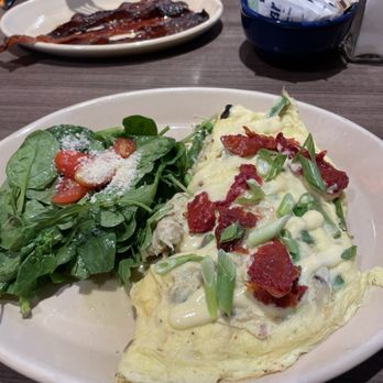 Snooze, an A.M. Eatery - Crab and Asparagus Omelette with a side of candied bacon. - Breakfast & Brunch Near Me - Orange, California Snooze, an A.M. Eatery - Crab and Asparagus Omelette with a side of candied bacon. - Breakfast & Brunch Near Me - Orange, California