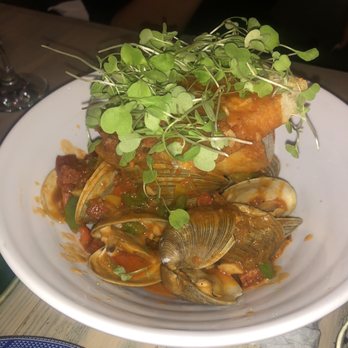 Bocaditos Bistro - Chorizo stew clams with baguette , so flavorful and rich great quality - Breakfast & Brunch Near Me - New York, New York Bocaditos Bistro - Chorizo stew clams with baguette , so flavorful and rich great quality - Breakfast & Brunch Near Me - New York, New York