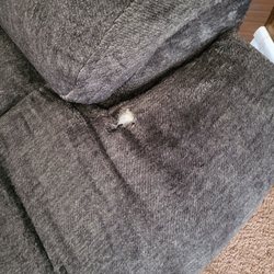 Farmers Furniture - This hole is not located in a high-pressure area. As you can clearly see, this is not caused by wear.