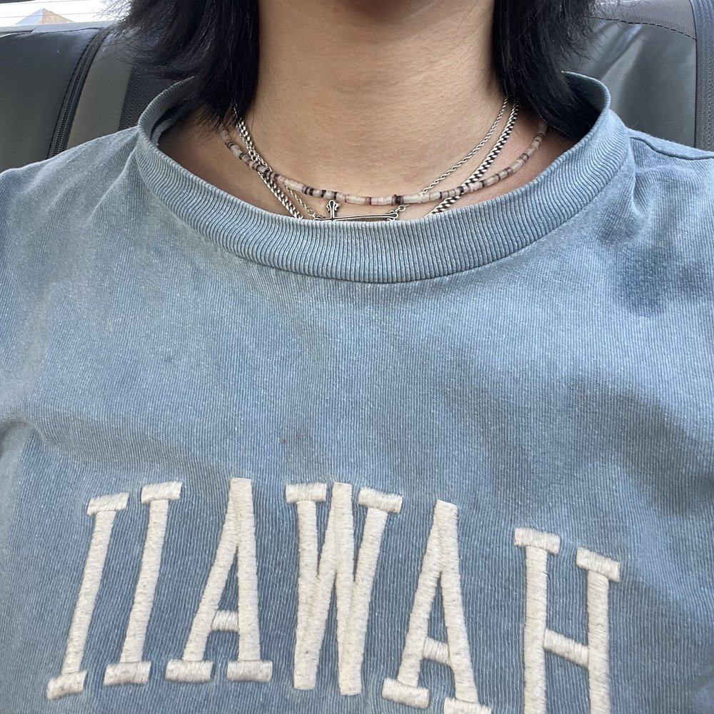 Look how stretched the neckline is. And the bug oil spots on the right.