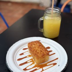 Frida Café Bar - Corn bread garnished with caramel and fresh orange juice