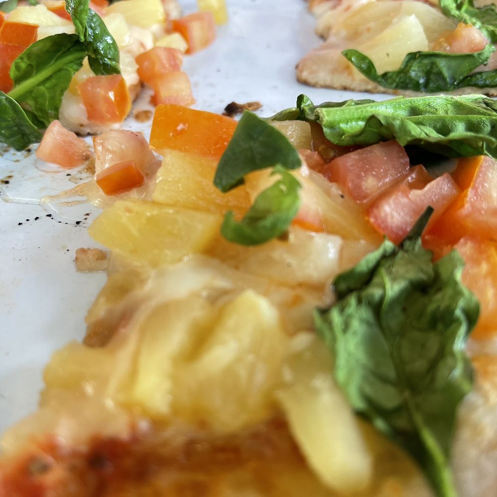 Pineapple, spinach, tomato pizza Pineapple, spinach, tomato pizza