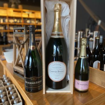 The Hidden Bin - a bottle of champagne and two bottles of wine - Wine Tasting Room Near Me - Mooresville, North Carolina The Hidden Bin - a bottle of champagne and two bottles of wine - Wine Tasting Room Near Me - Mooresville, North Carolina
