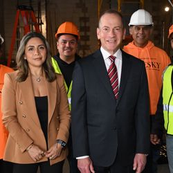 Oresky & Associates - Jacob Oresky, accident lawyer and Lucia Espinoza, office manager with construction workers. Bronx construction accident lawyers