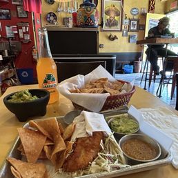 Fried Fish Taco - along with homemade Chips & fresh Guac!! Soooo Good. Fried Fish Taco - along with homemade Chips & fresh Guac!! Soooo Good.