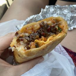 Half of the Bulgogi Kimchi Burrito, so good! Half of the Bulgogi Kimchi Burrito, so good!