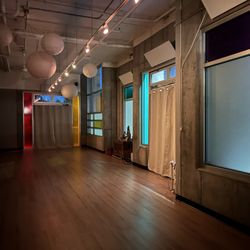 The Practice Space - Yoga and pilates mat studio shown.