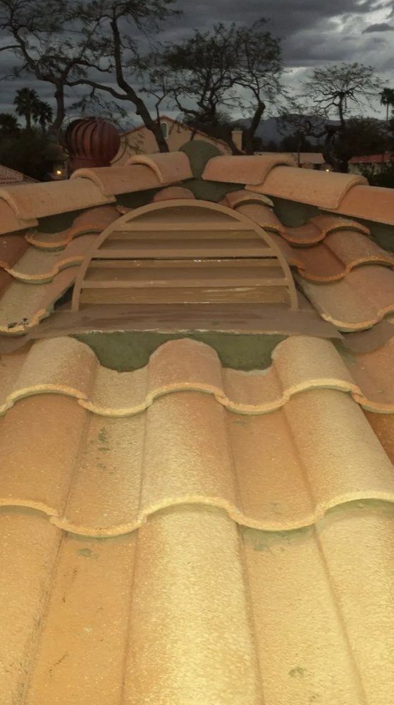 Slide of Romero's Roofing