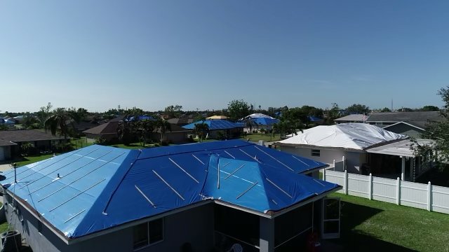 Slide of Pro Tarp Roofing Solutions