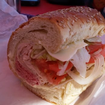 Subs Up Deli - a sub sandwich with lettuce and tomatoes - Delis Near Me - Beach Haven, New Jersey