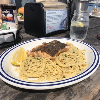 Fish - Sea bass over pasta with olive oil and garlic - Seafood Near Me - Sausalito, California Fish - Sea bass over pasta with olive oil and garlic - Seafood Near Me - Sausalito, California