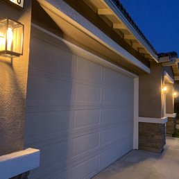 Electrical added and lanterns installed outside garage.
