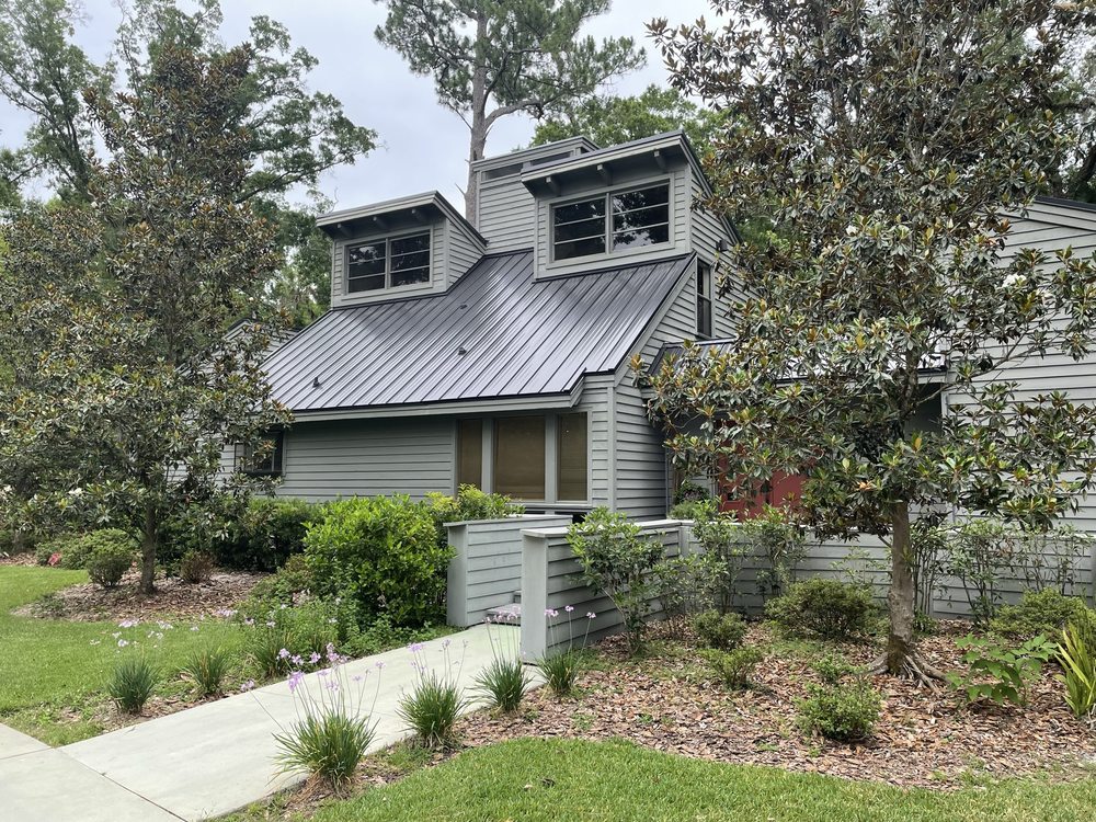 Slide of Roof Pros USA