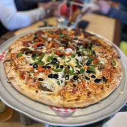 Davanza's - Vegetarian pizza with pepperoni on a half