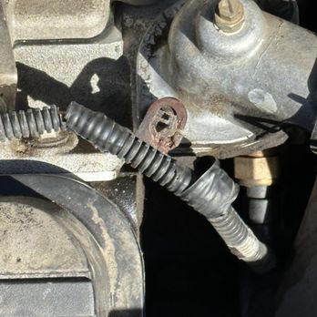 Greg's Garage - Damaged harness bracket - Smog Check Stations Near Me - Reno, Nevada Greg's Garage - Damaged harness bracket - Smog Check Stations Near Me - Reno, Nevada