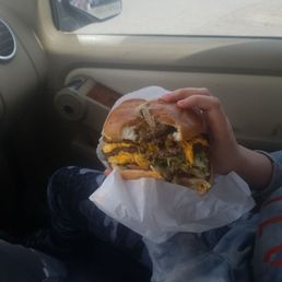 One pound cheeseburger with extra cheese and mushrooms
