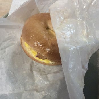 Dunkin' - Bacon, egg, and cheese with the packaging drenched in butter - Donuts Near Me - Haverhill, Massachusetts Dunkin' - Bacon, egg, and cheese with the packaging drenched in butter - Donuts Near Me - Haverhill, Massachusetts