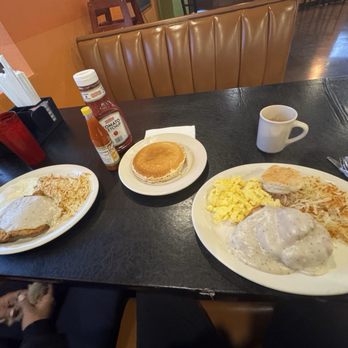 Rowlett Cafe - Chicken fried steak and sunny side up eggs on the left, chicken fried chicken and scrambled eggs on the right! - Breakfast & Brunch Near Me - Rowlett, Texas