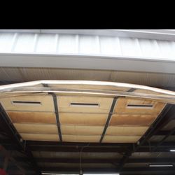 Johnny's Automotive - This is the bay door damaged caused by the mechanic failing to put the vehicle in PARK.