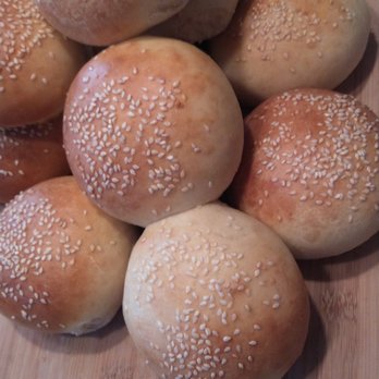 Thunder Baykery - a pile of buns on a cutting board - Bakeries Near Me - Alpena, Michigan