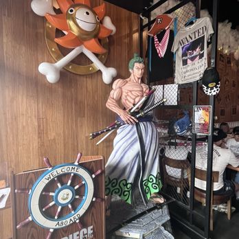 The Thousand Sunny - A statue of Zoro that greets everyone as they enter! - American Near Me - Pinecrest, Florida