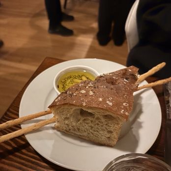 Il Nido - Focaccia w/ baked in sun chokes. Loved the taste but would have probably preferred the olives that come in it instead. - Italian Near Me - Seattle, Washington Il Nido - Focaccia w/ baked in sun chokes. Loved the taste but would have probably preferred the olives that come in it instead. - Italian Near Me - Seattle, Washington