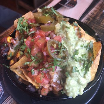 Mexicano's - Mexicano's chicken nachos - salsa, black beans, guacamole, jalapeño, and queso YUM - Cocktail Bars Near Me - Christchurch, CAN Mexicano's - Mexicano's chicken nachos - salsa, black beans, guacamole, jalapeño, and queso YUM - Cocktail Bars Near Me - Christchurch, CAN