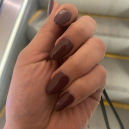 Oval shaped full set acrylics with a plum gel nail polish. Oval shaped full set acrylics with a plum gel nail polish.