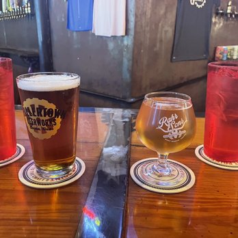 Pouring Glory - On the left - Yuengling On the right - HopFusion Ale Works Pom Wizard - Beer Bar Near Me - Fort Worth, Texas