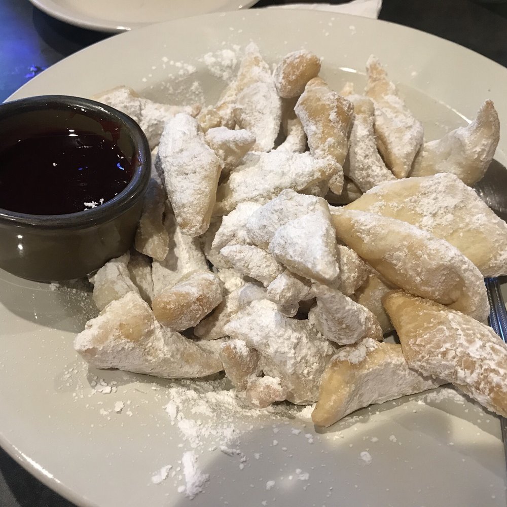 Sugar River Pizza - Beignets with raspberry sauce - Pizza Near Me - Verona, Wisconsin Sugar River Pizza - Beignets with raspberry sauce - Pizza Near Me - Verona, Wisconsin