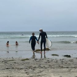 Concept Surf Shop - Colin the instructor giving student Colin tips