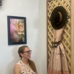 Secret Aura Boutique - Owner Merri showing me a display Shes put together.