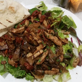 Capriccio Cafe - Mia salad: chicken, sun dried tomatoes, portabella mushrooms, shallot vinaigrette on mixed greens with pita - Italian Near Me - Stamford, Connecticut