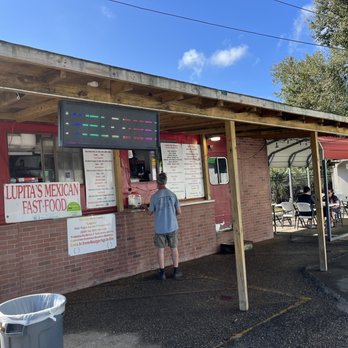 Lupita's Mexican Kitchen - a man ordering food - Mexican Near Me - Pensacola, Florida