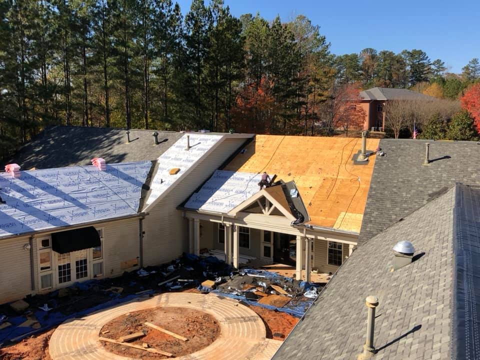 Slide of AMI Roofing